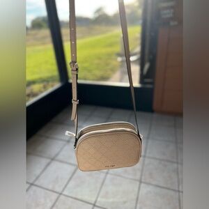 NEW WITH TAGS Nine West Vanilla Crossbody. Never  used. Beautiful design.